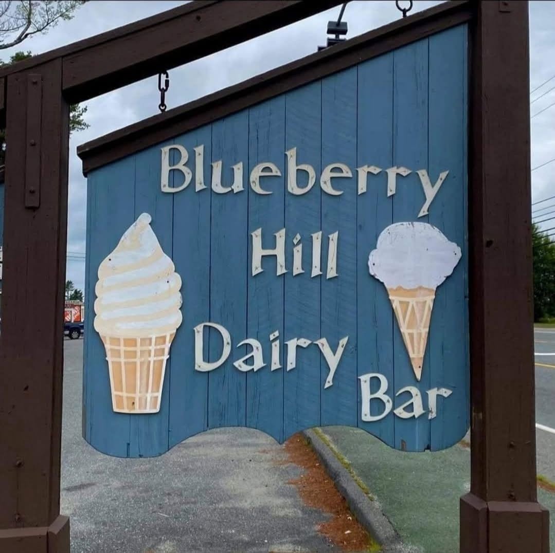 The real Blueberry Hill Dairy Bar roadside sign in Ellsworth, Maine